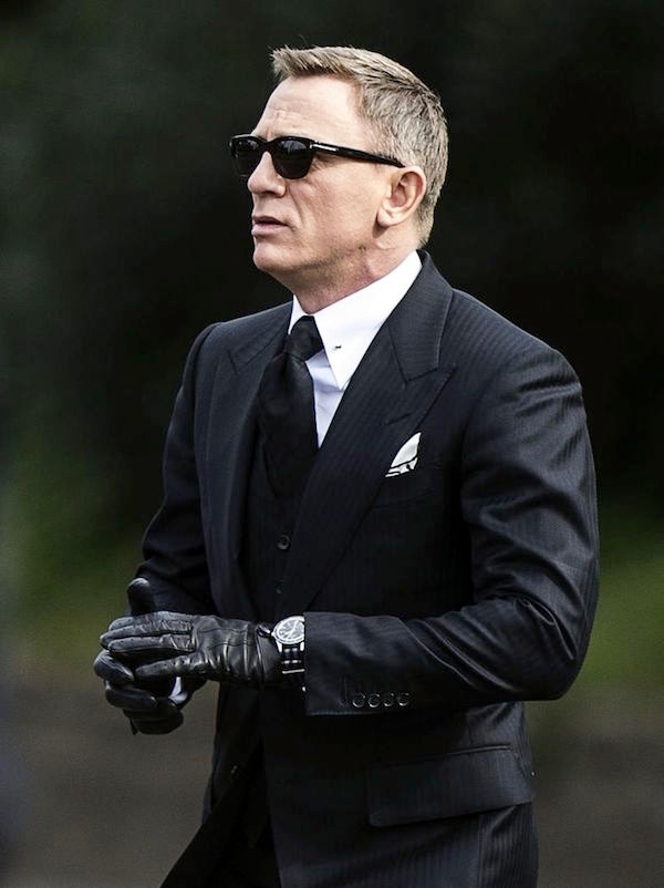 Daniel Craig wears the Omega Seamaster 300 SPECTRE Limited Edition with rare lollipop seconds hand and black and grey NATO strap.