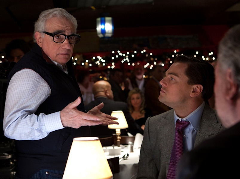 Martin Scorsese directs Leonardo Di Caprio and Bo Dietl during the making of Wolf of Wall Street, 2012.