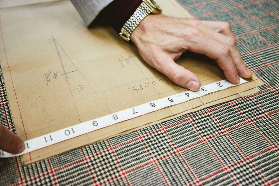 The material has a distinct Prince of Wales check.