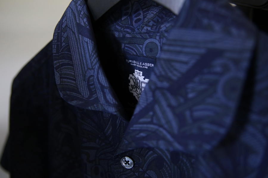 The shirts feature a special Turnbull & Asser x Mo Coppoletta x The Rake label.