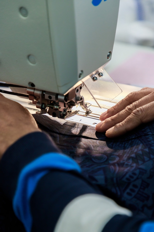 Sewing the pleats for the tuxedo shirt.