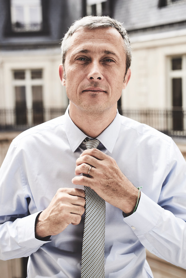 Christophe Goineau, the Artistic Director of men's silk, at Hermès' office in Paris. Photograph by Kim Lang.