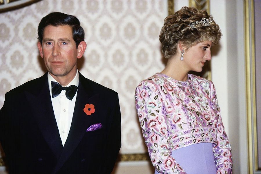 Prince Charles wears black tie brightened with a colourful pocket square with Princess Diana during a royal visit to South Korea, 2005.