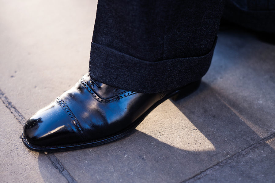 A pair of semi-bespoke Peter brogues from G.J. Cleverley are a good option to finish a formal ensemble for a festive-do. Photograph by Luke Carby.