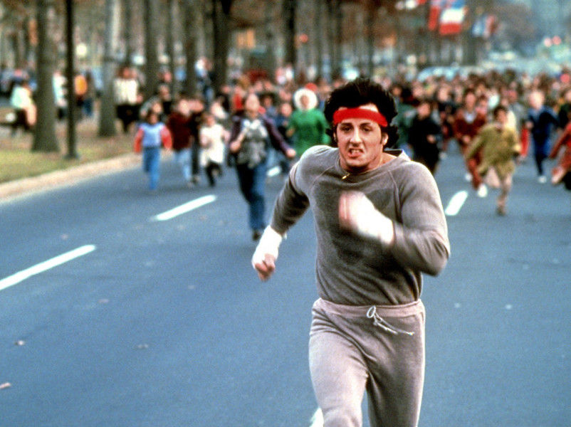 Rocky Balboa's red sweatband is the only dated part of his outfit: the grey tracksuit reigns supreme, over thirty years after Rocky IV was released.