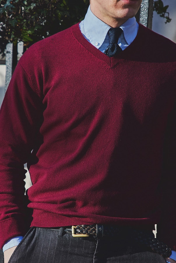 The V-neck cashmere jumper in maroon works well as a middle layer, here paired with a button-down shirt and knitted tie. Photograph by James Munro.