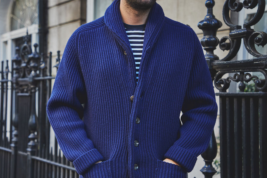 Made from 4-ply cashmere, the shawl collar cardigan is a stunning piece, featuring raglan shoulders, a six button front, twin patch pockets and a buttoned collar. Photograph by James Munro.