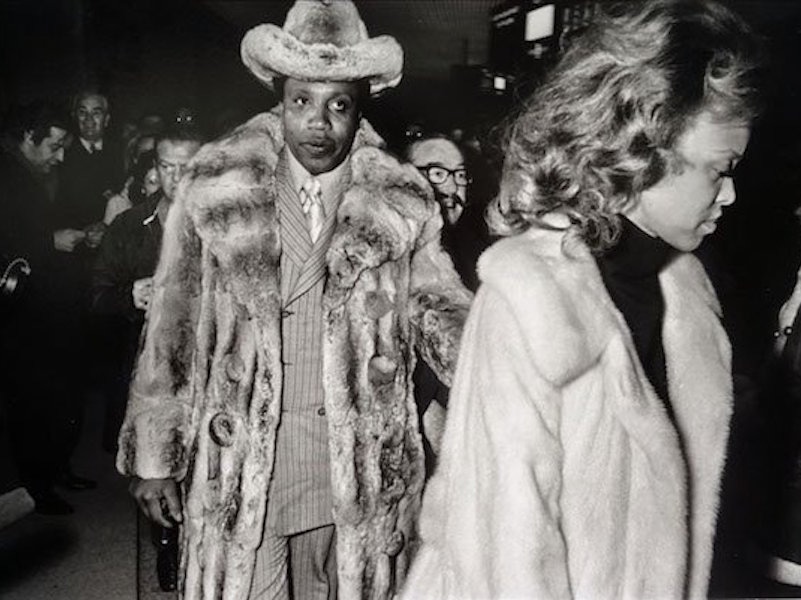 The real Frank Lucas wearing the infamous chinchilla fur coat to the 'Fight of the Century', 1971.