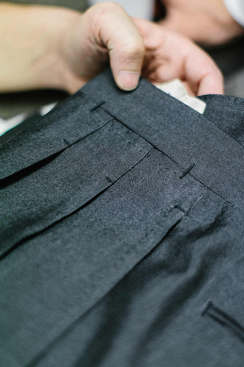 A close-up of Neapolitan trouser specialist Marco Cerrato's reverse pleated trousers, which showcase the handiwork that goes into each pair, such as immaculate top stitches, bar tacks and pressing. Photo by Jamie Ferguson.