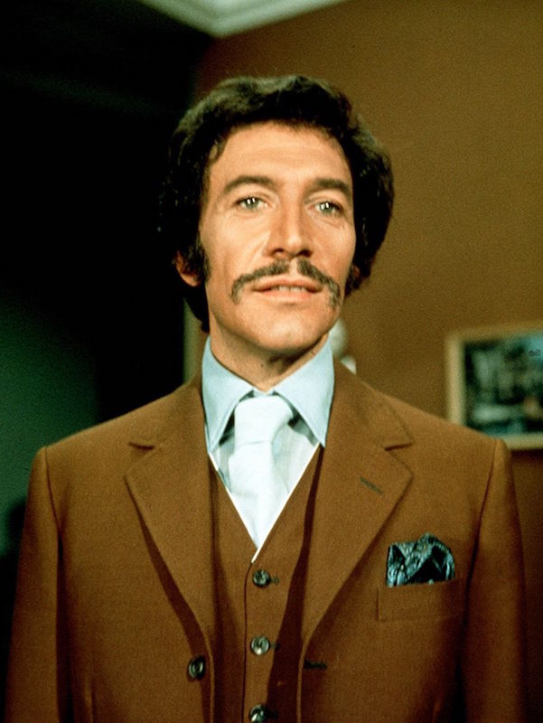 Wyngarde wearing his distinctive matching shirt and tie with a high-buttoning three-piece in Department S, 1969. Photo by ITV/REX/Shutterstock.