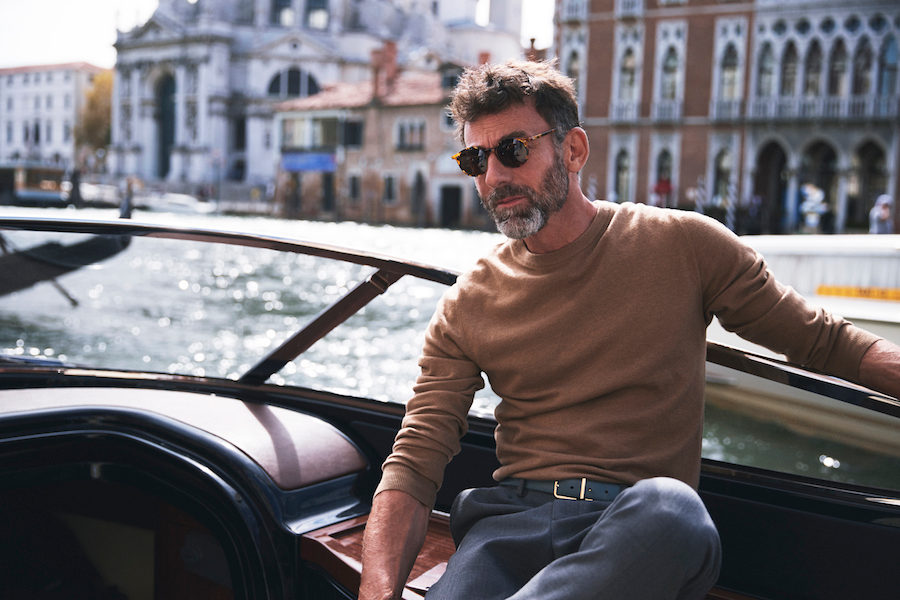 Camel wool jumper, Moncler; slate grey wool trousers, AMI; amber tortoise and tobacco lenses sunglasses, The Bespoke Dudes at The Rake. Sea green leather belt, property of The Rake.