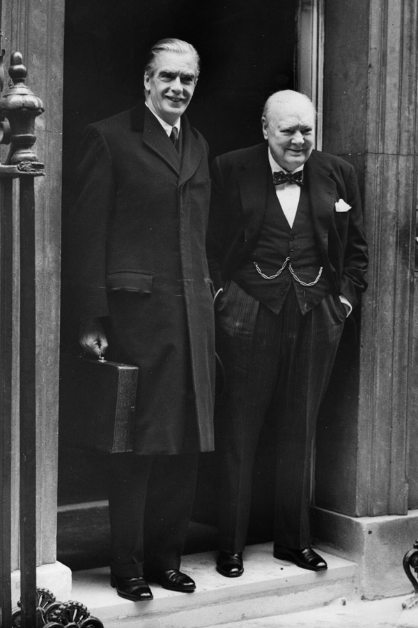 Churchill with Sir Anthony Eden on the steps of 10 Downing Street, London, 1955. He wears his Breguet pocket watch on a chain that looks suspiciously like a 'W'.