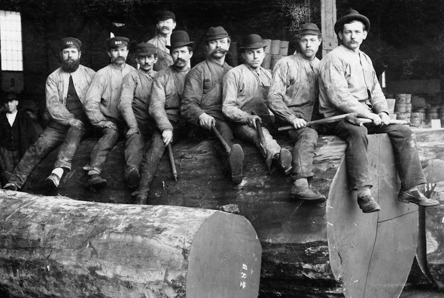 Gold miners wearing denim jeans and cotton over-shirts, circa 1900s.