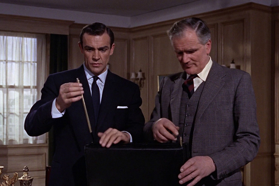 James Bond examines the deadly contents in his briefcase in 1963's From Russia with Love.