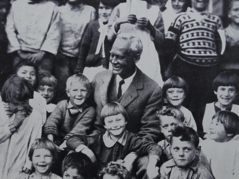 Sir Wilfred Grenfell with orphans from the St Anthony Orphanage. The majority lost their fathers at sea during fishing expeditions, circa 1938.