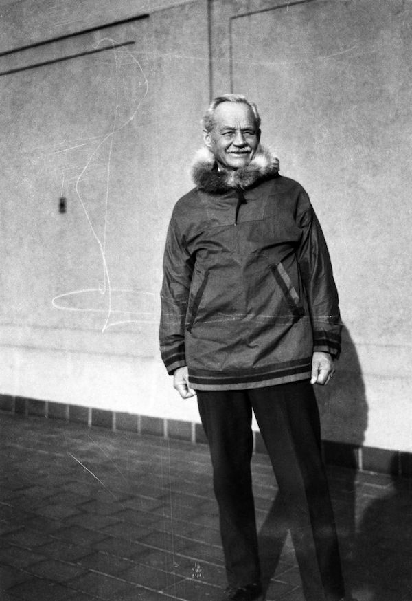 Sir Wilfred Grenfell wearing a kagoule-like jacket in Grenfell Cloth with a fur-trimmed hood, circa 1938.