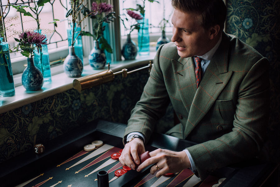 Another rule Tom lives by: “Try and match your socks with your tie, or match something. I like that the red in this Sera Fine silk tie picks out the red in the jacket’s overcheck and my socks.”