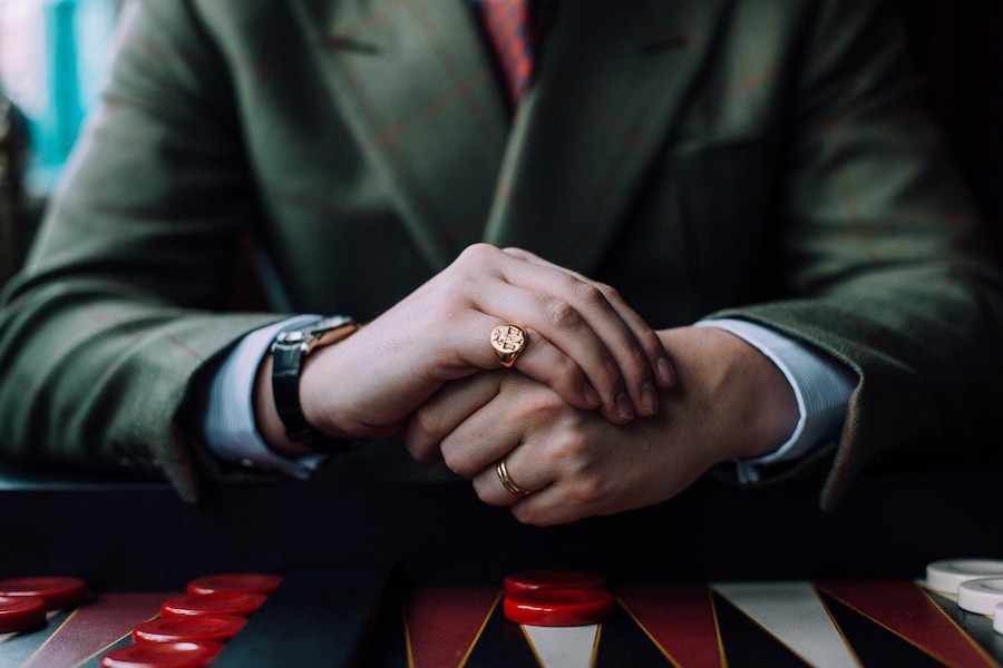 Tom’s signet ring is a Norfolk Penny signet ring, a family crest which he received on his 21st birthday. He wears two wedding bands, a chunkier one from Cartier and a more delicate one from Wartski, the Royal Family’s jeweller.