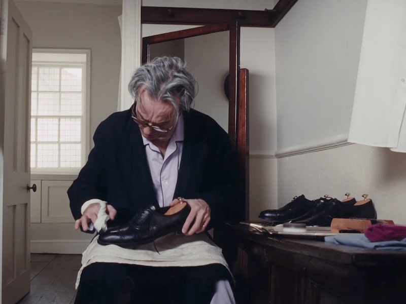 Day-Lewis’ character polishes his bespoke Oxford shoes made by George Cleverley as part of his morning routine.