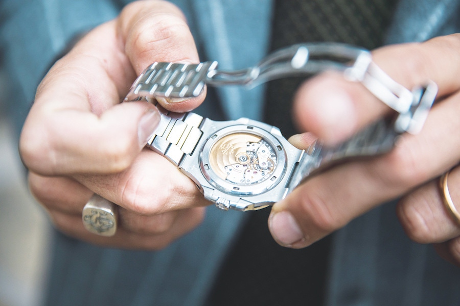 A 2009 Patek Philippe Nautilus 5711 in steel. “I received this as a gift for my 30th birthday. I love the flat case, and the Nautilus is a perfect compromise between elegance and sport: you can wear it with a smoking jacket, or with T-shirt and Bermudas. The vintage silver ring was owned by my uncle and godfather Sebastiano Guardì.