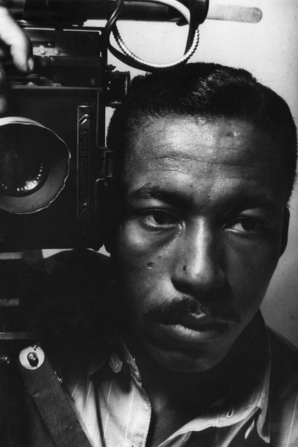 Parks' self-portrait using a vintage flash bulb camera, 1946.