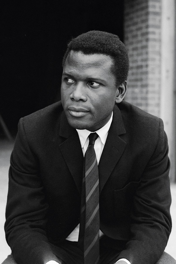 Poitier demonstrating the art of elegant tailoring.