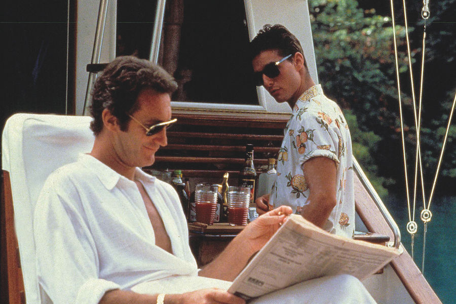 Tom Cruise plays the mischievous bar tender sporting various short-sleeve, billowy Hawaiian shirts in Cocktail, 1988. Photograph by Moviestore/REX/Shutterstock.