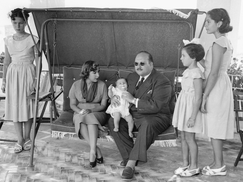 King Farouk pictured in exile with his family on the island of Capri, 1953.