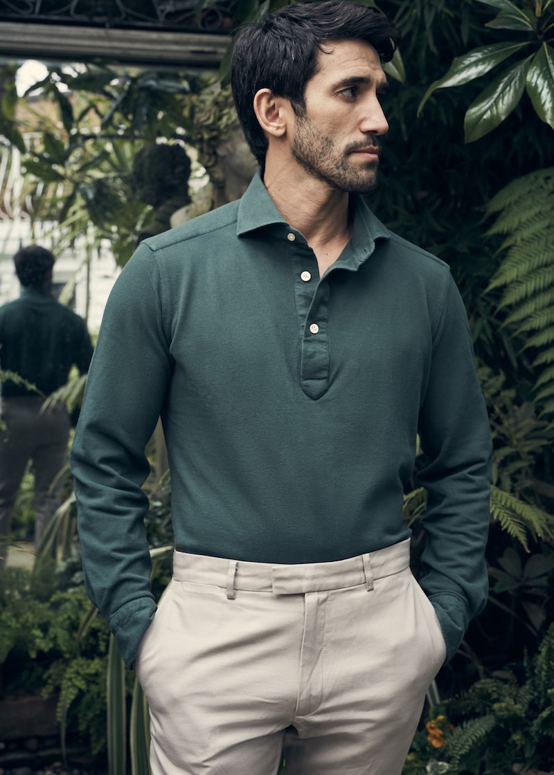 Forest green long sleeve polo shirt, Luca Avitabile; cream cotton trousers, Enlist. Styling by Jo Grzeszczuk, photograph by Olivier Barjolle.