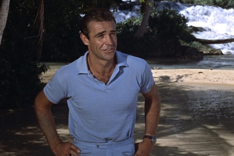 Sean Connery matches a light blue polo shirt with a pair of similar coloured shorts in Dr No., 1962.
