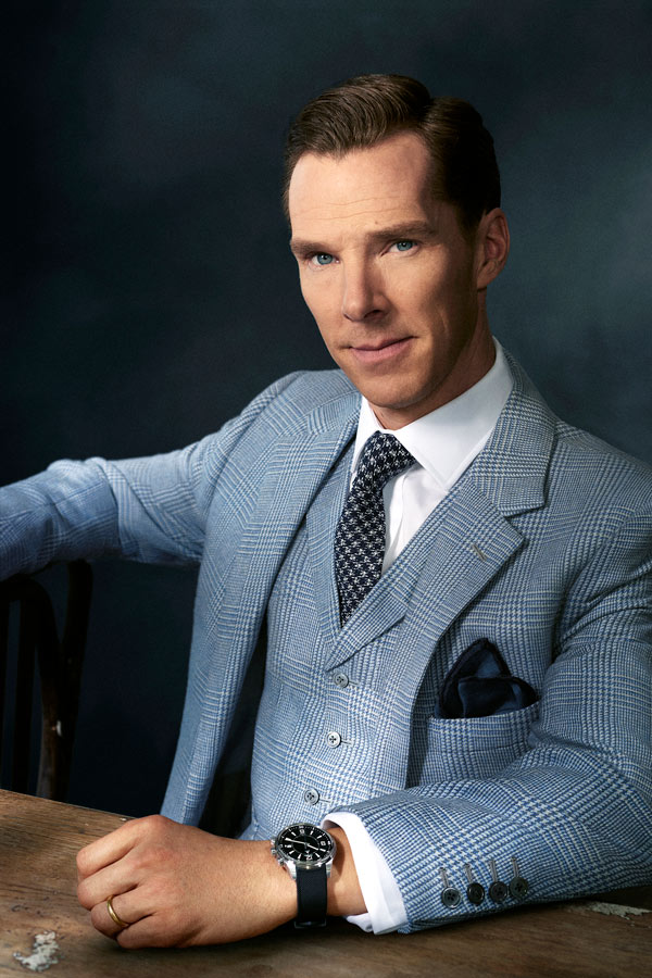 Sky-blue glen check wool, three-piece suit, bespoke MBE by Tim Everest; white cotton shirt and navy and white silk houndstooth tie, both Emma Willis; navy silk pocket handkerchief, Thom Sweeney. Jaeger-LeCoultre Polaris Memovox timepiece in stainless steel with a black rubber strap.