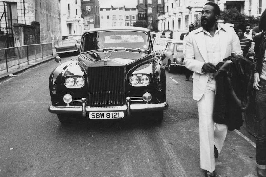 Gaye walking ahead of his Rolls Royce in Notting Hill, London in 1976. Photograph by John Minihan/Evening Standard/Getty Images.