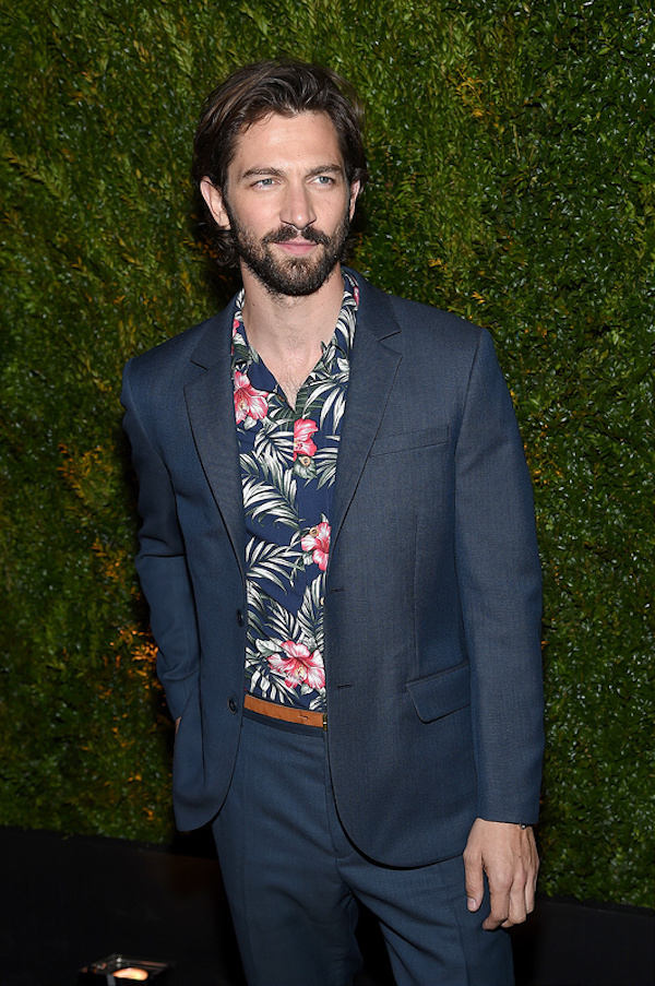 Michiel Huisman attends the Chanel Dinner during the 2015 Tribeca Film Festival in a Jack Wills navy single-breasted suit and a Haspel Hawaiian shirt.