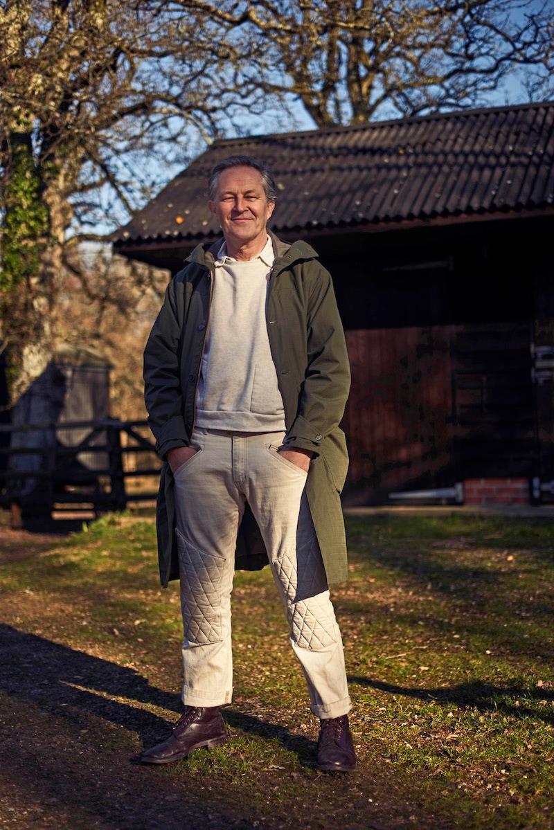 Under his parka are Nick’s “new-old stock, dirty whites”. Up top is another of Nick’s Private White designs: the ‘Track’ sweatshirt has two front “drop pockets, so when you put things in they fall in and stay there”. Made by his own brand in Japan in the 1990s, his trousers are a hybrid style made from heavyweight cotton with padded knees and slanted front pockets. He’s dubbed the “motocross chinos”.