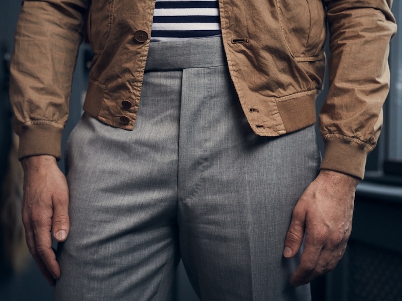 Avena beige cotton jacket, Valstar; striped long-sleeve T-shirt and light grey wool trousers, Anderson & Sheppard. Styling by Jo Grzeszczuk, photograph by Olivier Barjolle.