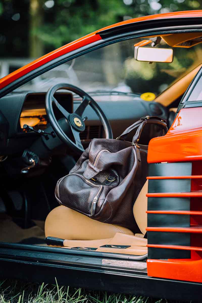 A peak at the interior of The Rake's Ambassador, Alain Gafundi, vintage 1990 Ferrari in classic red.