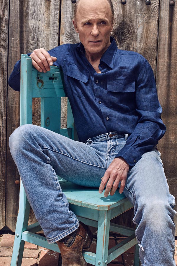 Blue linen safari shirt, Ralph Lauren Purple Label at Harrods. Blue denim jeans and brown leather cowboy boots, both property of Ed Harris.