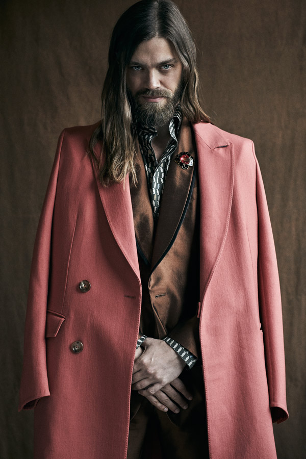 Salmon wool coat, Ermenegildo Zegna Couture; brown silk, three-piece suit, Dolce & Gabbana; brown cotton penguin printed shirt, Marol.