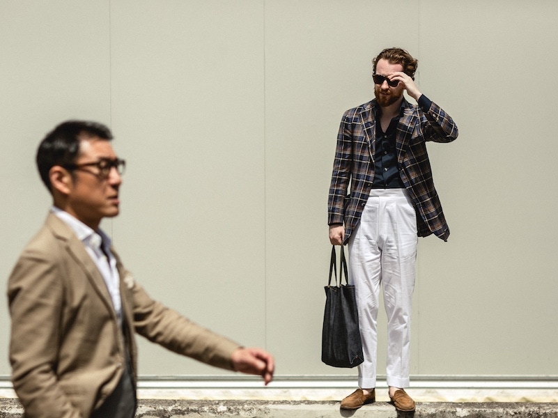 Jim Parker of The Armoury provides no error with a white trouser which meets a navy shirt and checked jacket.