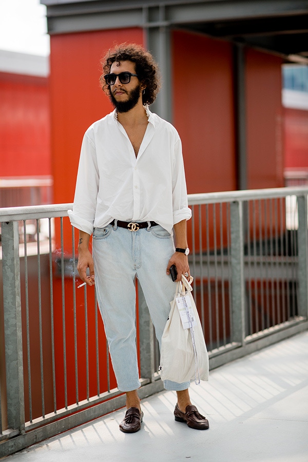 Could you get more sprezzatura? Cropped tapered jean, burgundy tassel loafers and simple white shirt casually tucked at the front to draw attention to the Gucci belt.