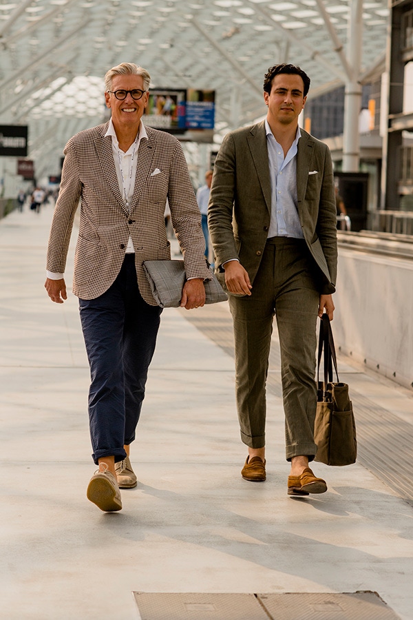 Navy cotton chinos are the perfect stage for a casual roll-up, while the more structured formality of the green linen suit  calls for a 2in turn-up.