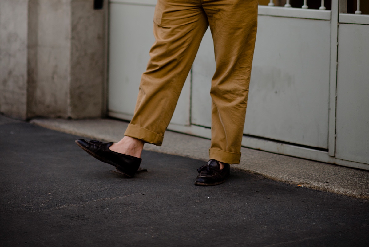 This gentleman has opted for a very slight crop with a large turn-up. On a heavier shoe or boot, these would possibly be the correct length but with a loafer the effect is slightly cropped.