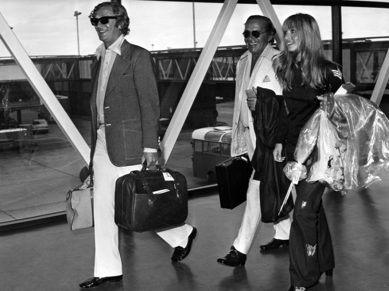 Michael Caine and Suzy Kendall arriving in London, 1971. Photograph courtesy of Alamy.