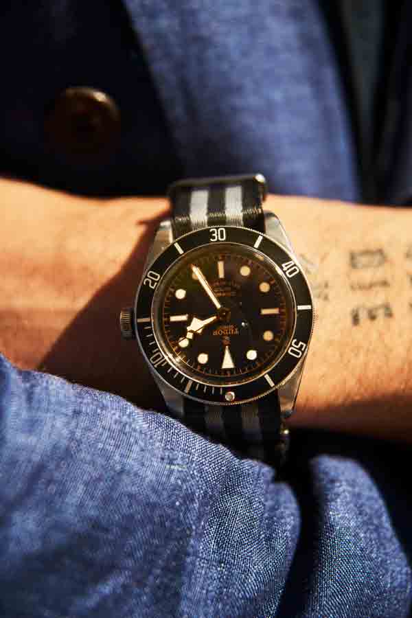 Karl is wearing a Tudor Black Bay diver’s watch with a NATO strap. “I can chuck it around and it fits my way of life,” he says.