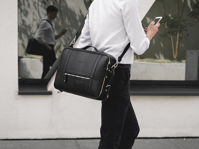 A sleek black Temporary Forevers bag will complement your monochrome looks.