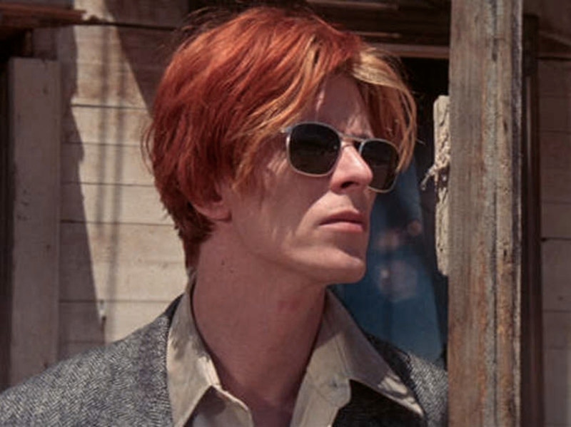 Bowie sported a blonde and flame orange wedge haircut with a neat centre parting for his role as Thomas Jerome Newton.