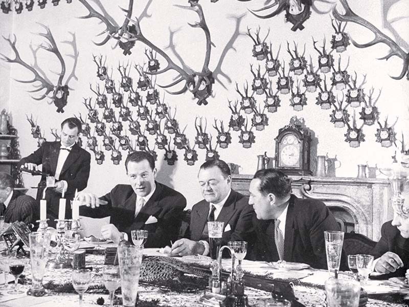 Czech premier Klement Gottwald at a dinner party after a pheasant shoot.