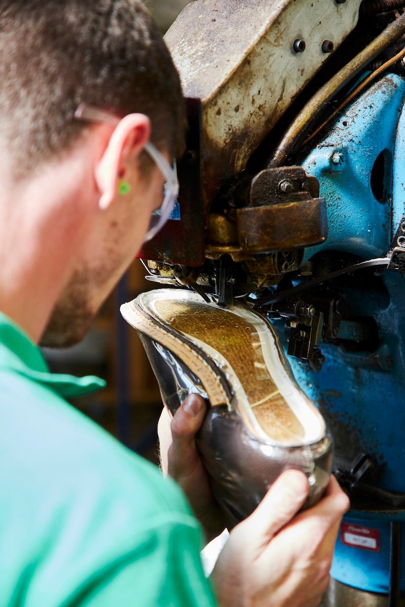 The Goodyear-welt is closed through the sole which requires excellent hand-to-eye coordination so to operate the machine. Photo by James Munro.