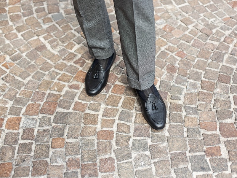The houndstooth Manny trouser is cut full with two deep, forward-facing pleats. They come unfinished – we suggest you take them to your tailor and request a turn-up of 2 inches and pair them with the Marphy loafer. Photograph by Shaun Darwood.
