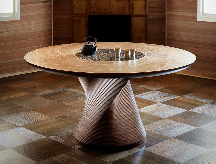 The Torque dining table combines our signature use of wood and unrivalled craftsmanship to suggest movement as depicted in the sinuous architecture of the Guggenheim Museum or contemporary fashion.